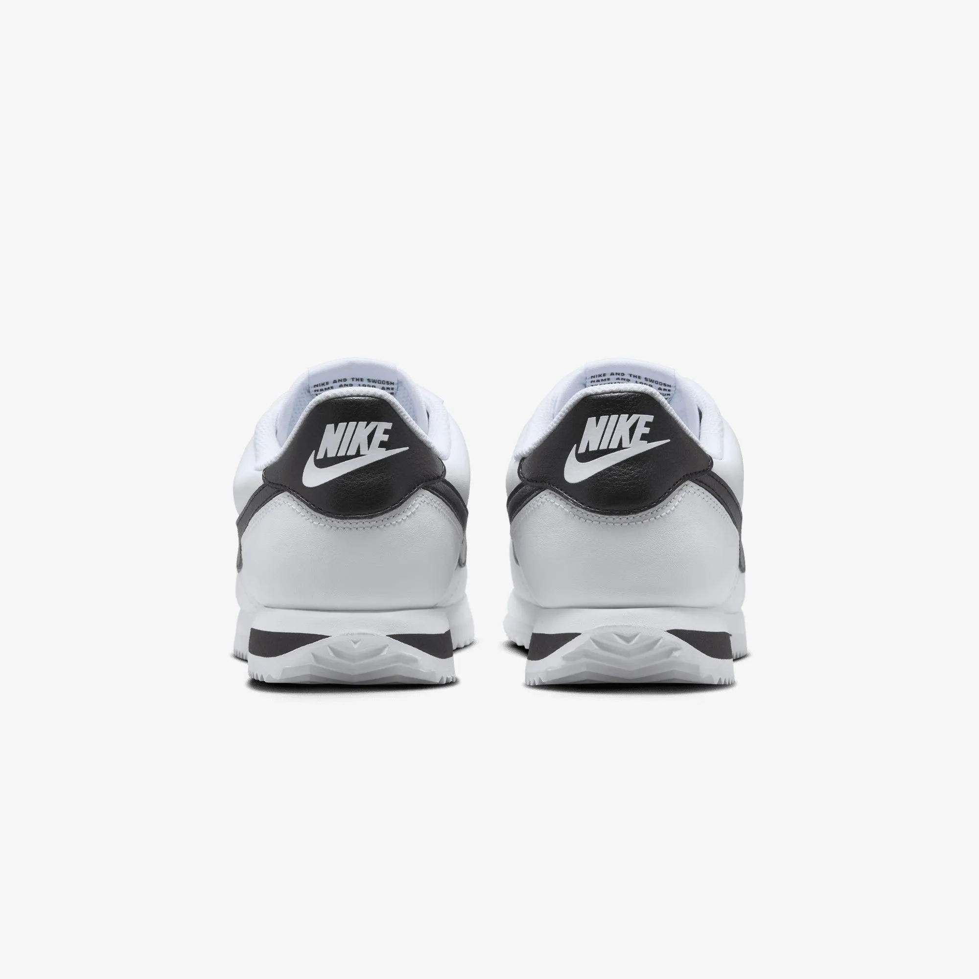 Anatomical shape NIKE | CORTEZ LEATHER { WHITE/BLACK