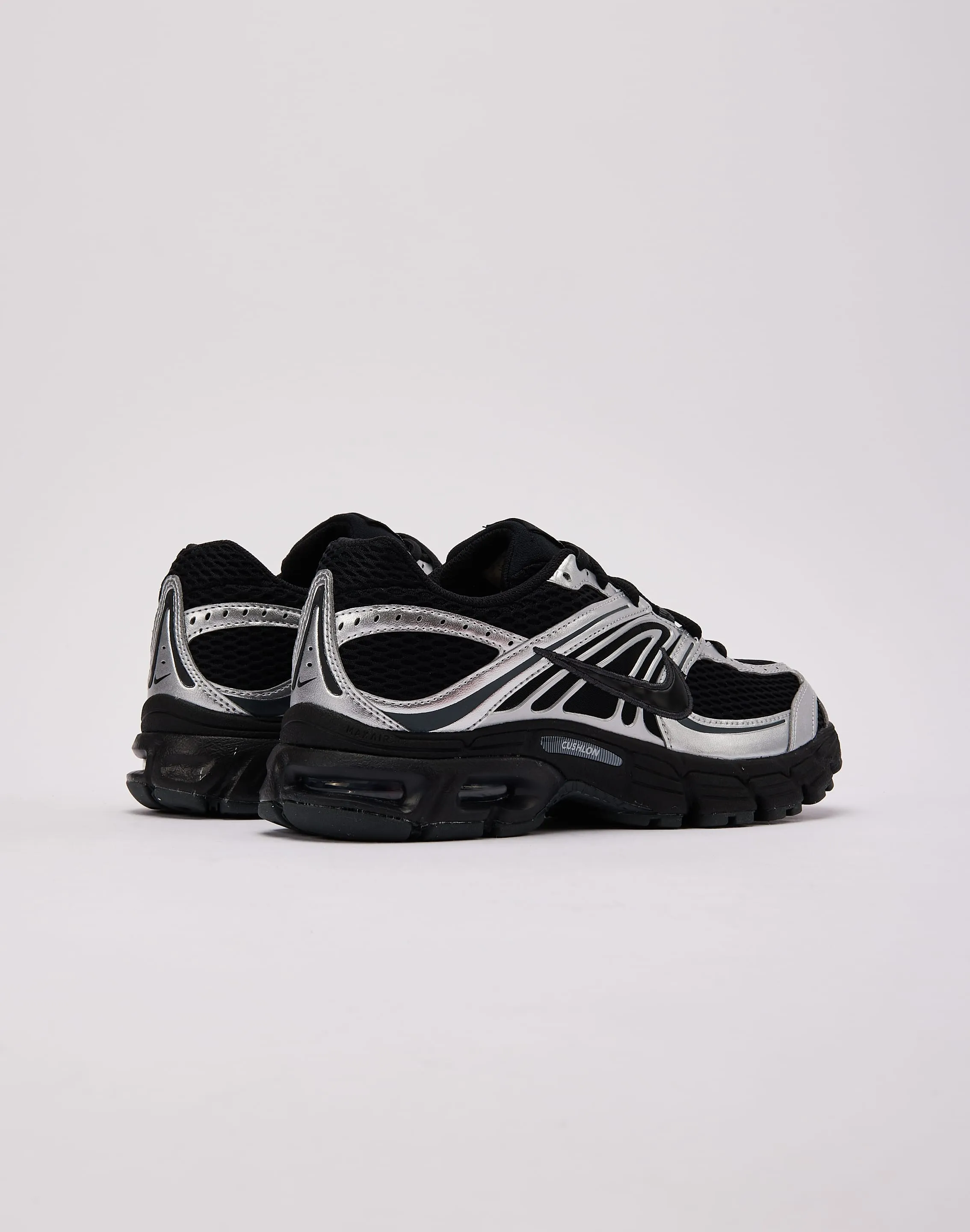 Nike Air Max Moto 2K running with a durable outsole