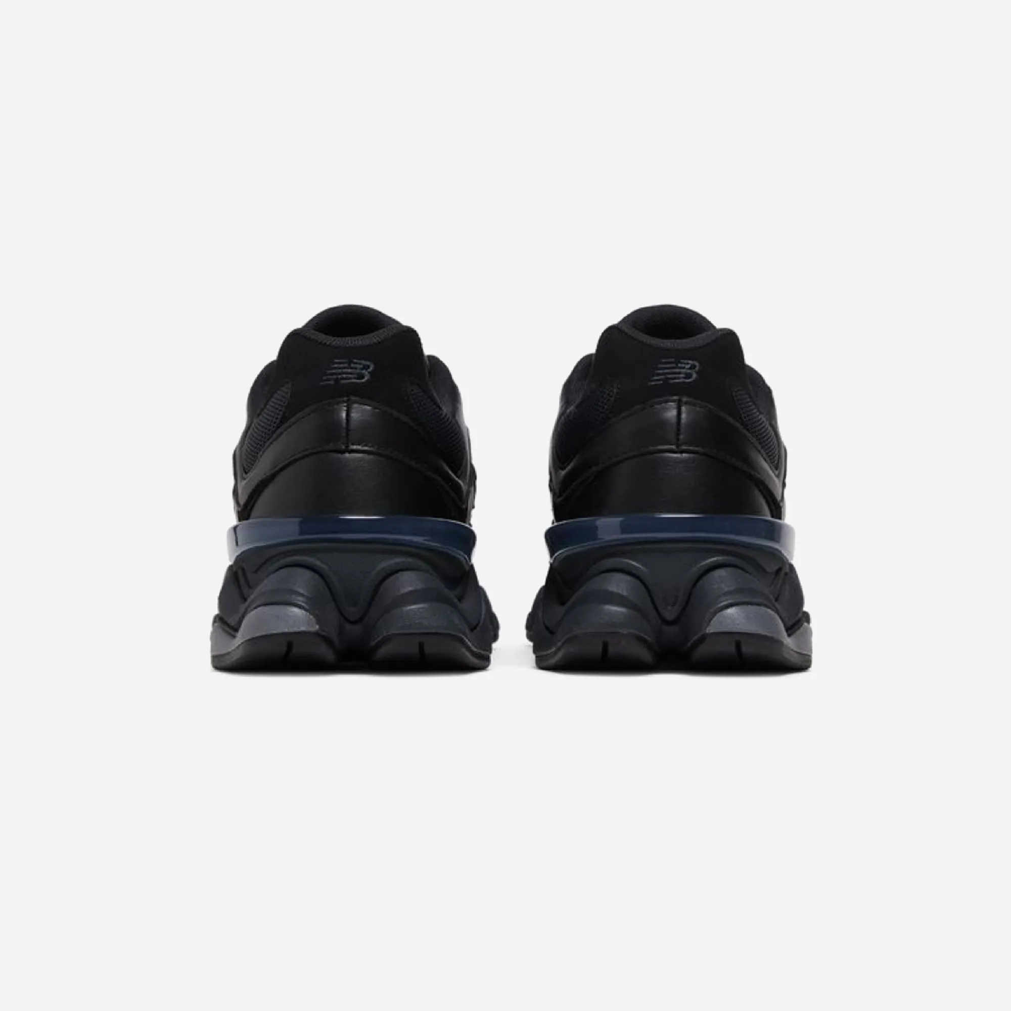 running in a stadium shoes recycled shoes New Balance 9060 Triple Black Leather