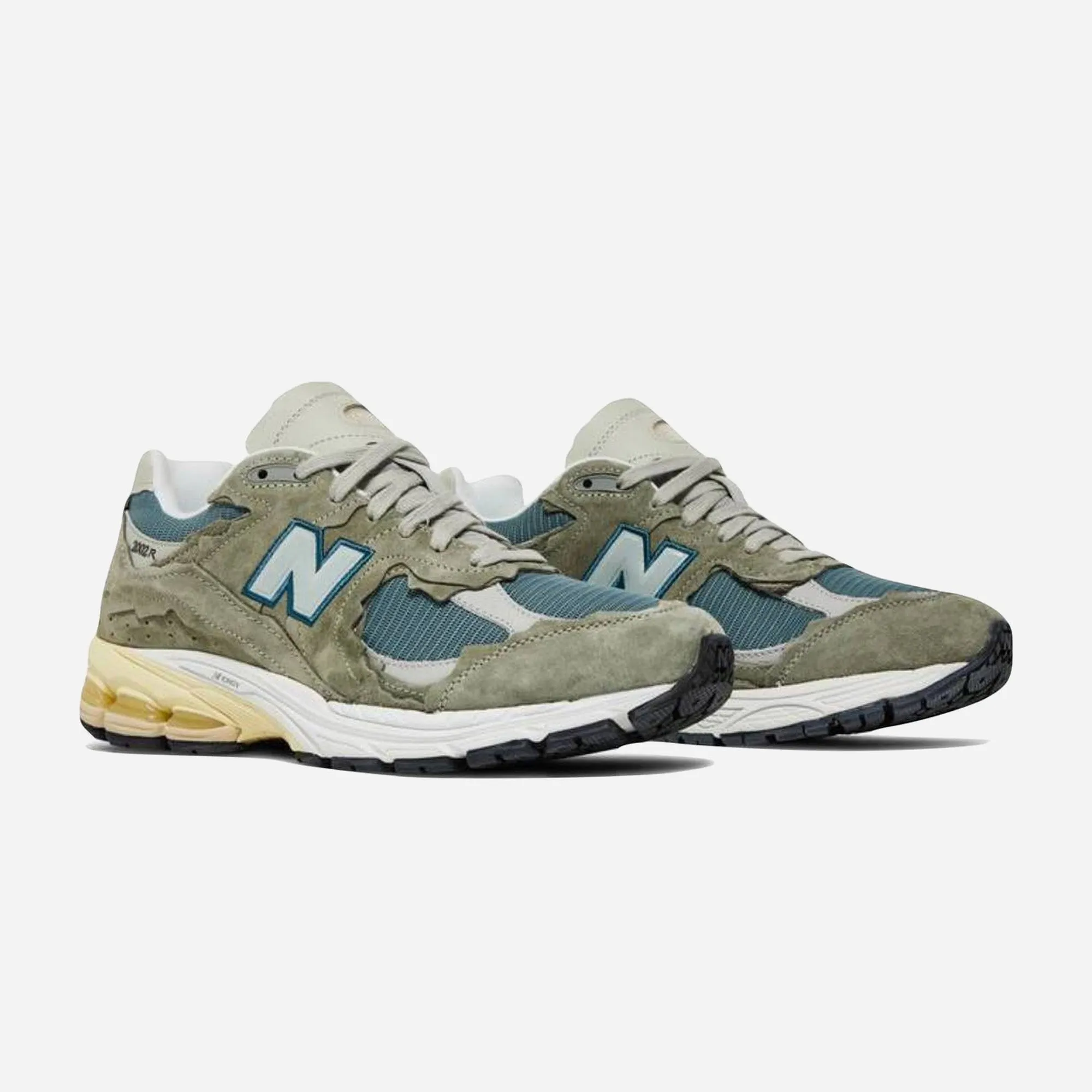 New Balance 2002R Protection Pack Mirage Grey oval - design shoes
