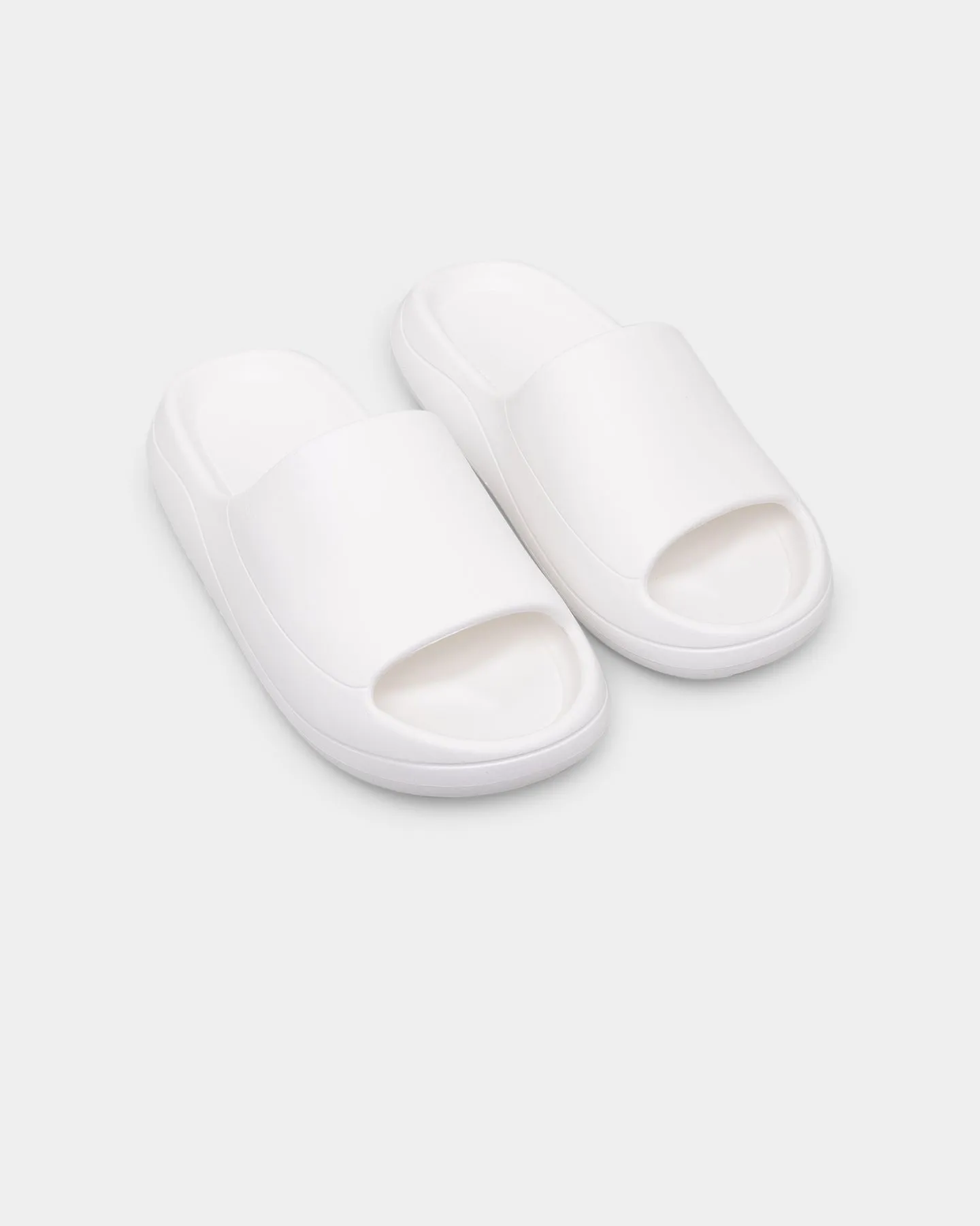 Elevn Clothing Co Wade Slide White Pose Ready Flexible Fit City Adventure