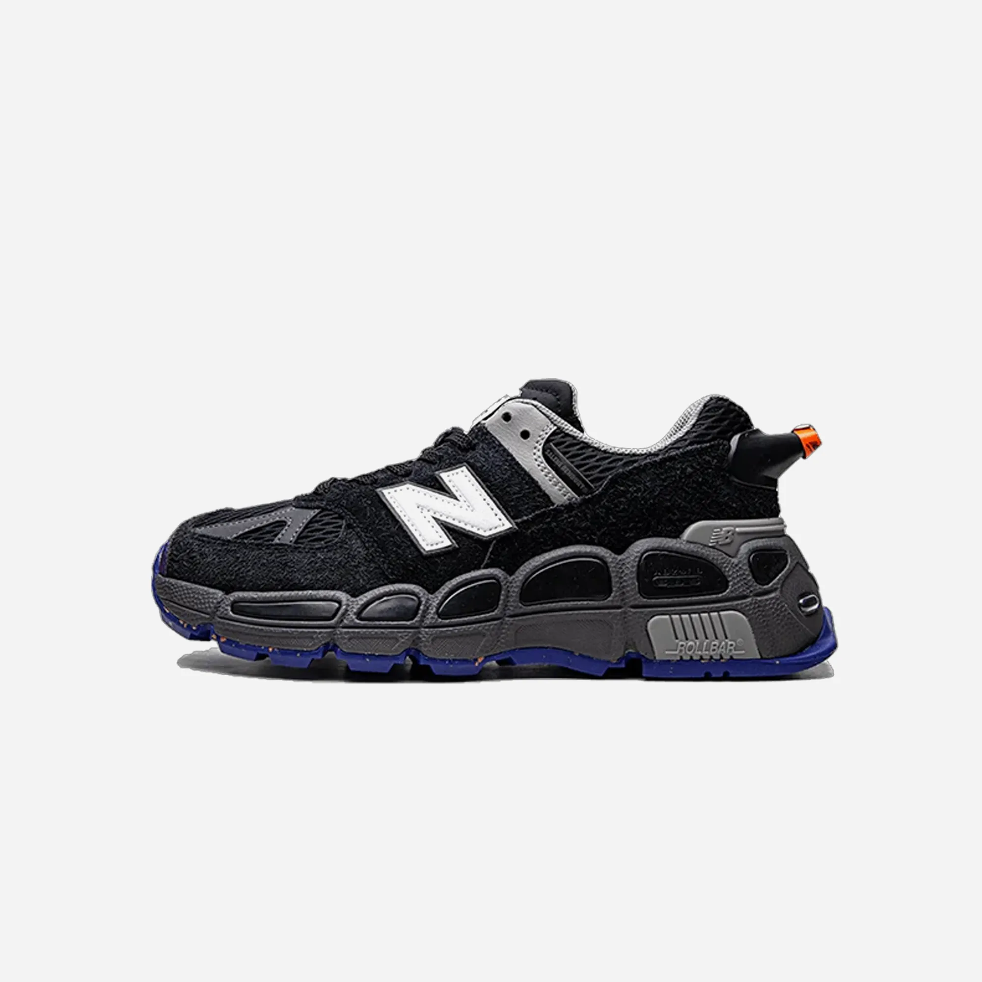 New Balance 574 YURT Salehe Bembury Universal Communication Black Plum running in a bascule bridge area shoes quiet shoes