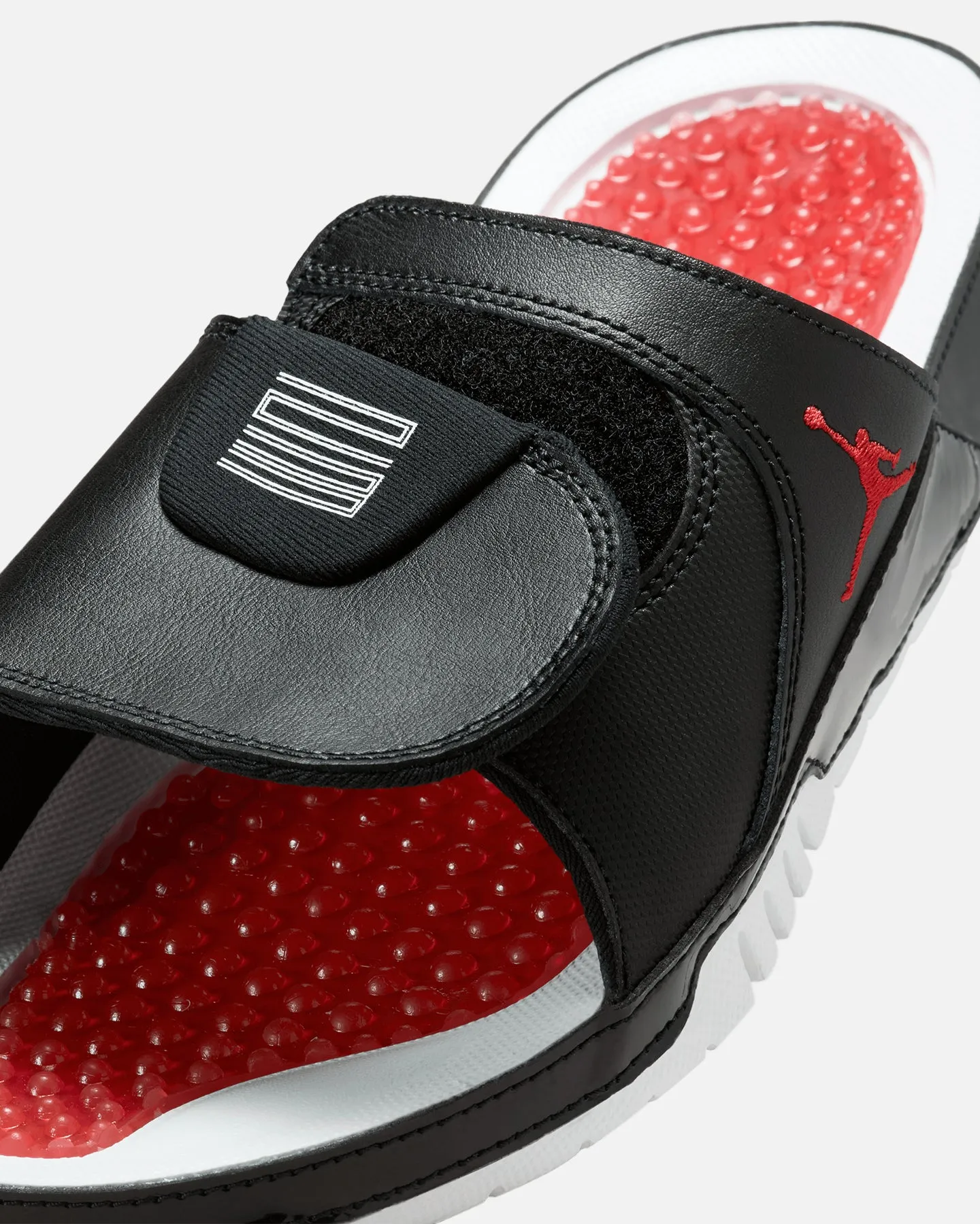 Jordan Hydro XI Retro Slides Black/White Care Ease