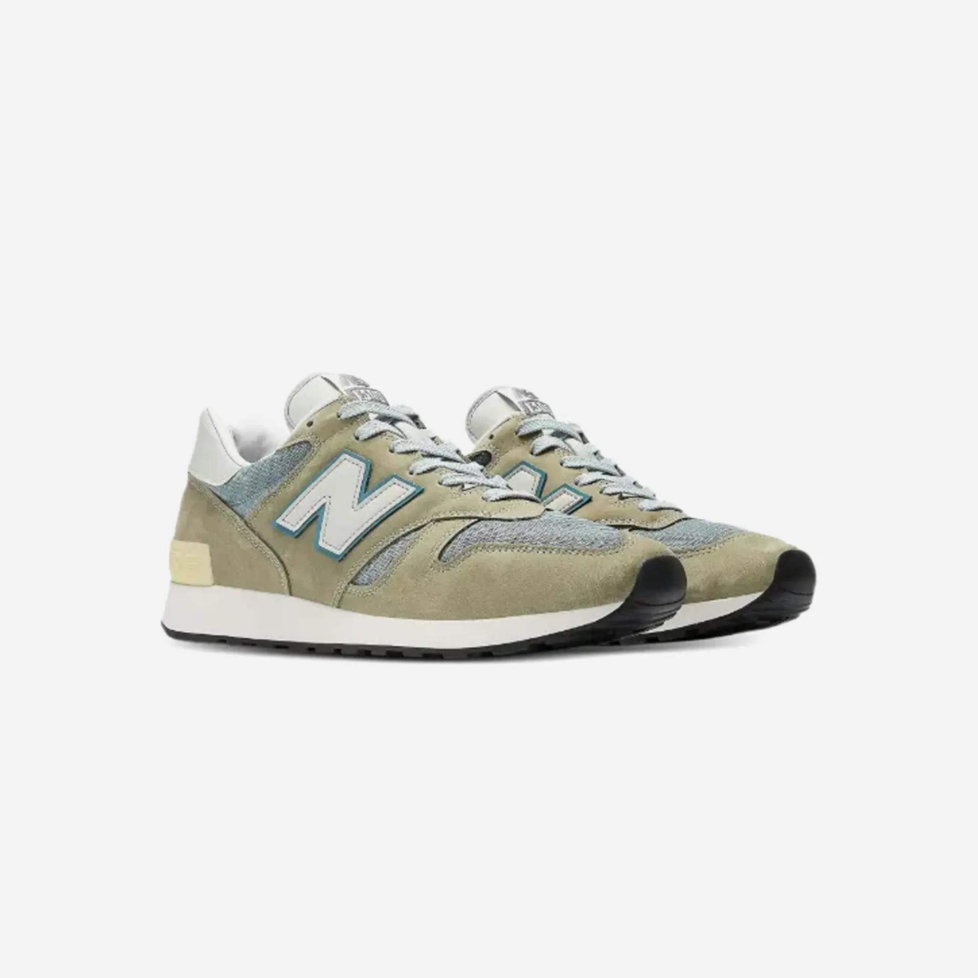 New Balance 1300JP MiUSA Mirage Grey running in the city