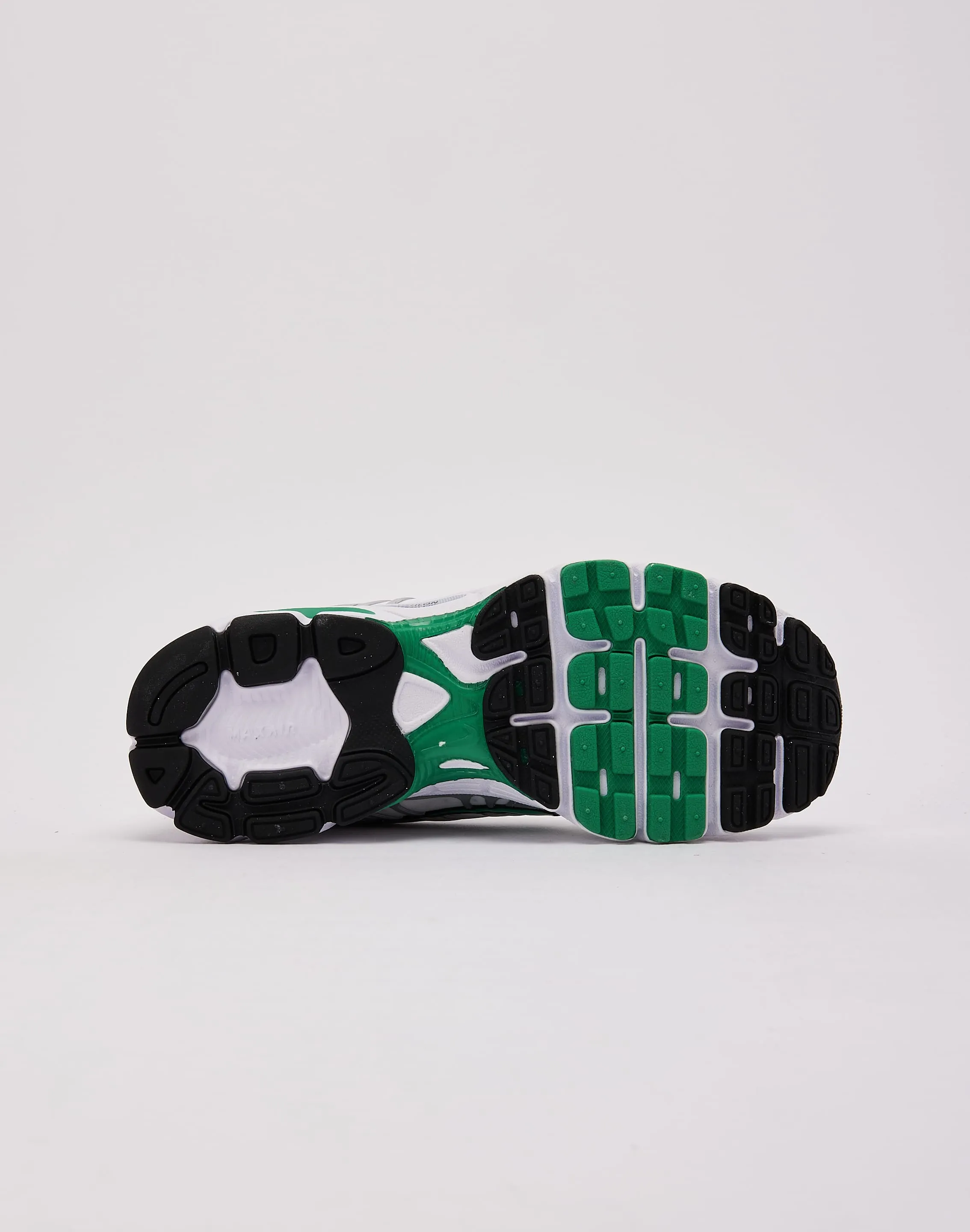 Nike Air Max Moto 2K running in a ditch area shoes