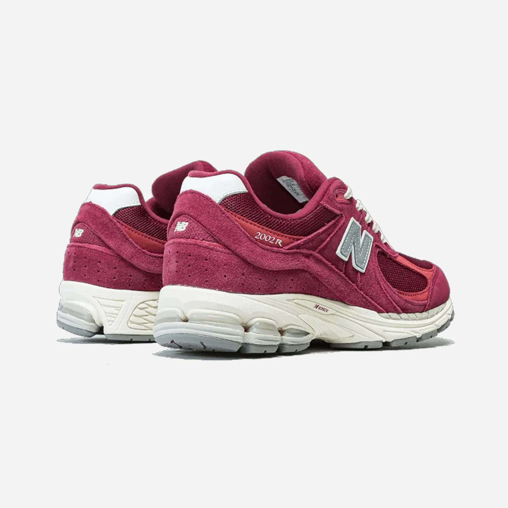 running on grass New Balance 2002R Seude Pack Garnet Deep Earth Red