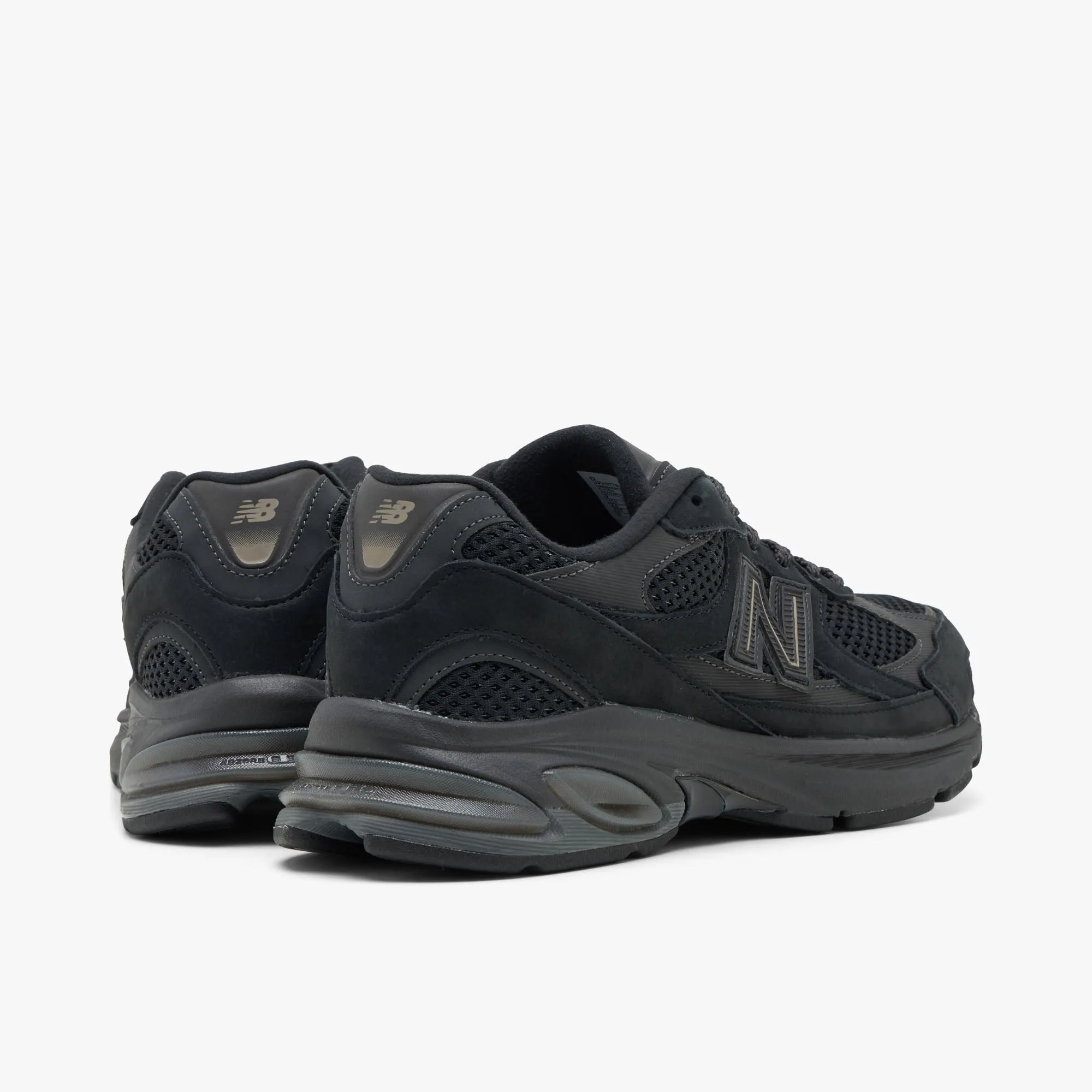 New Balance 2010 Black / Black Cement Multi Surface