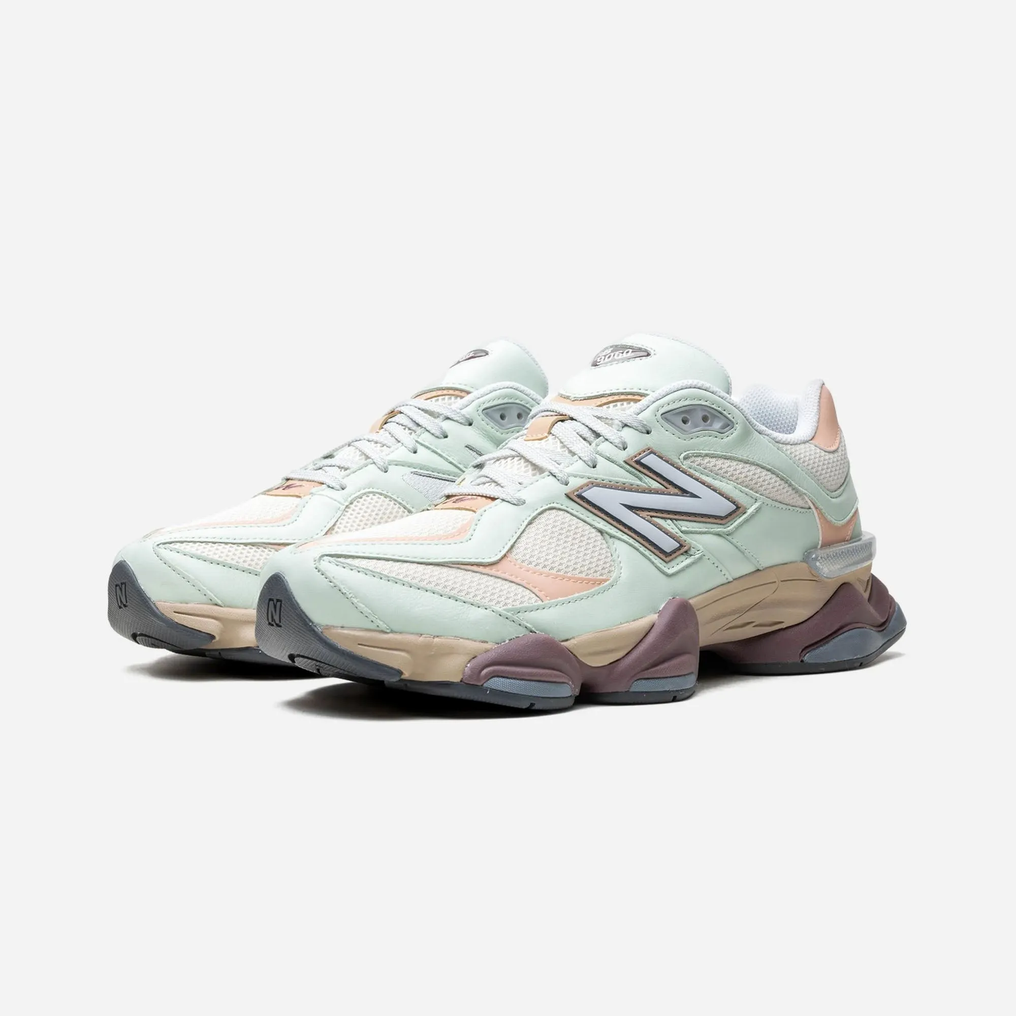 running with a cushioned midsole New Balance 9060 Clay Ash