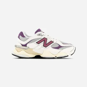 running in a metal bridge area shoes New Balance 9060 Magenta