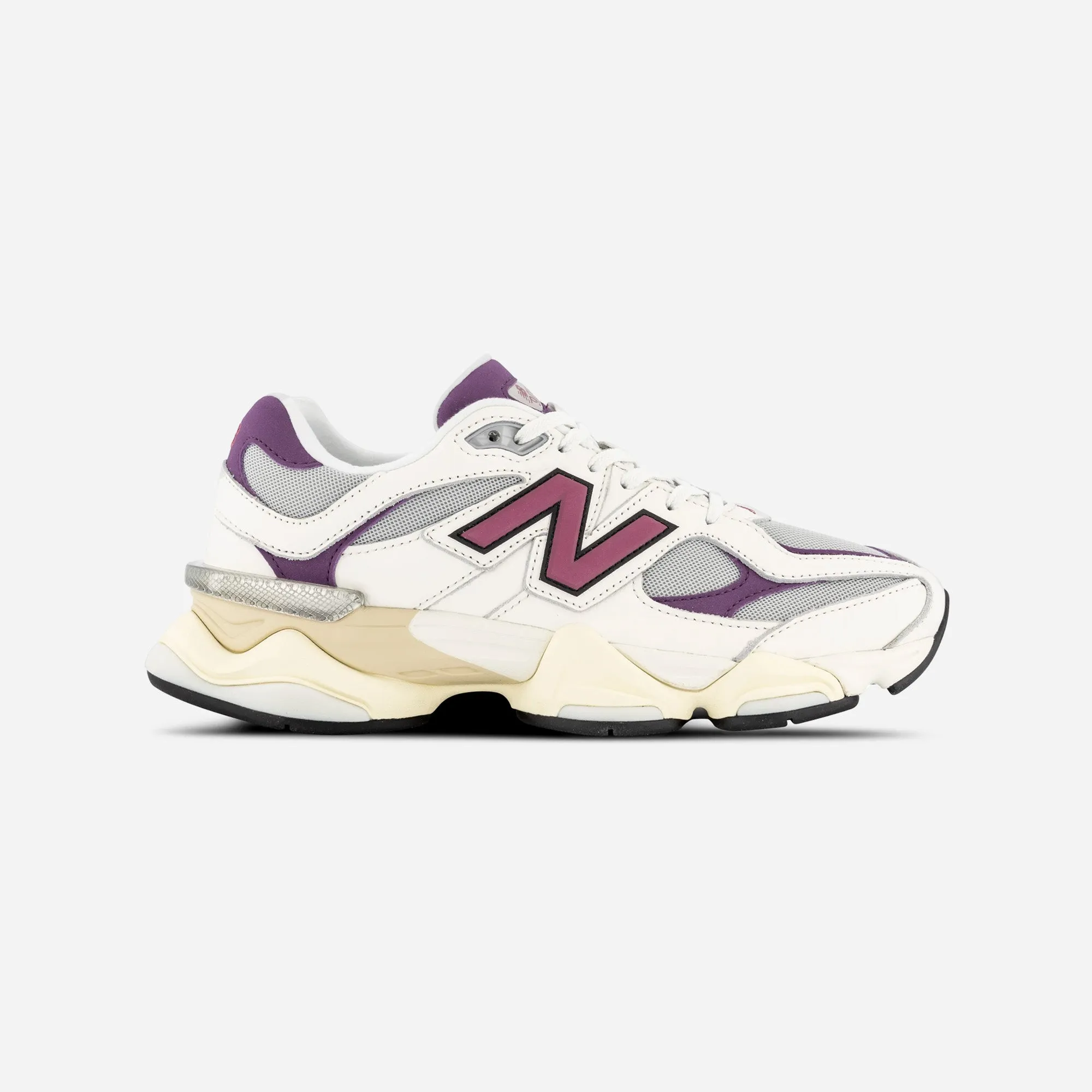 running in a metal bridge area shoes New Balance 9060 Magenta