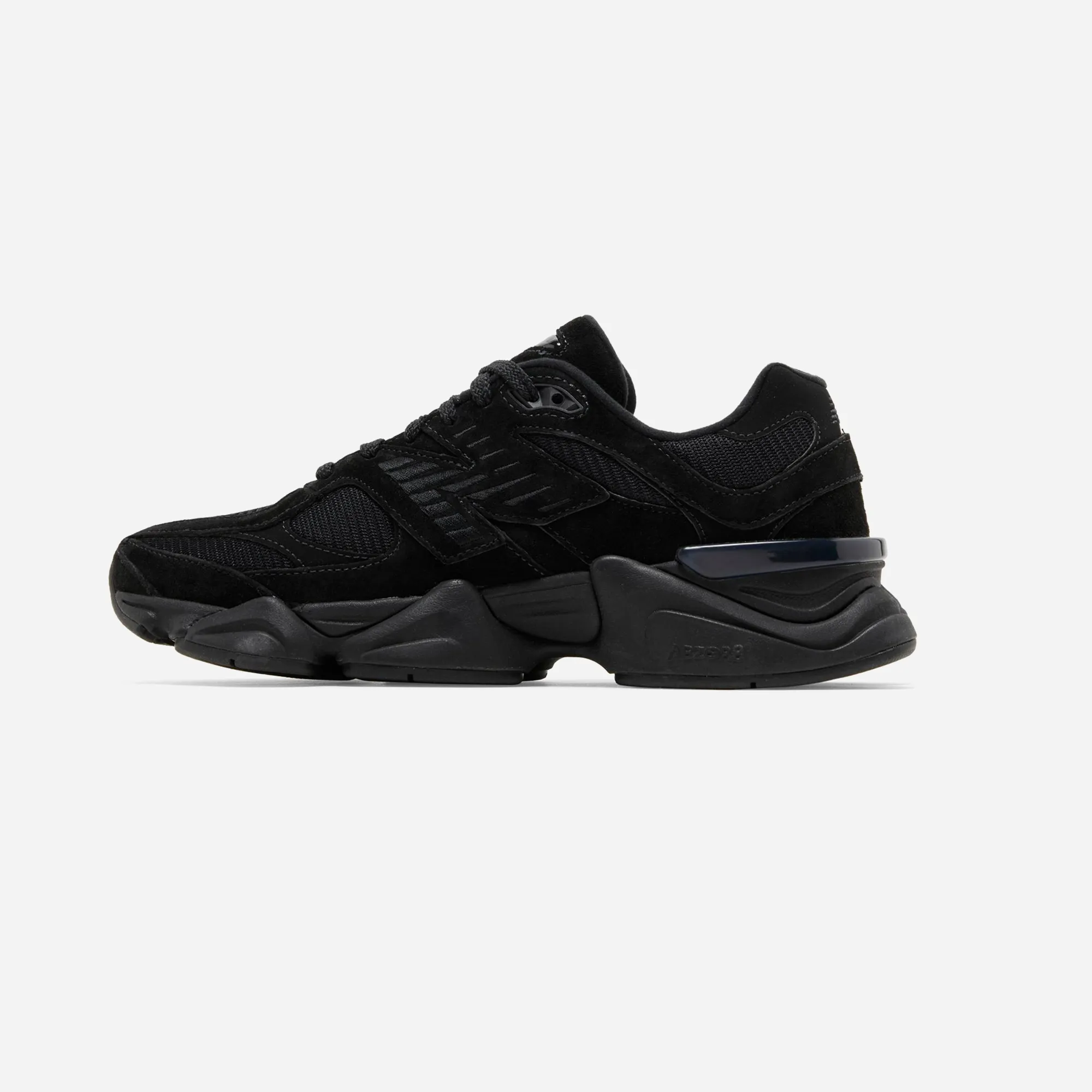 New Balance 9060 Triple Black shiny shoes