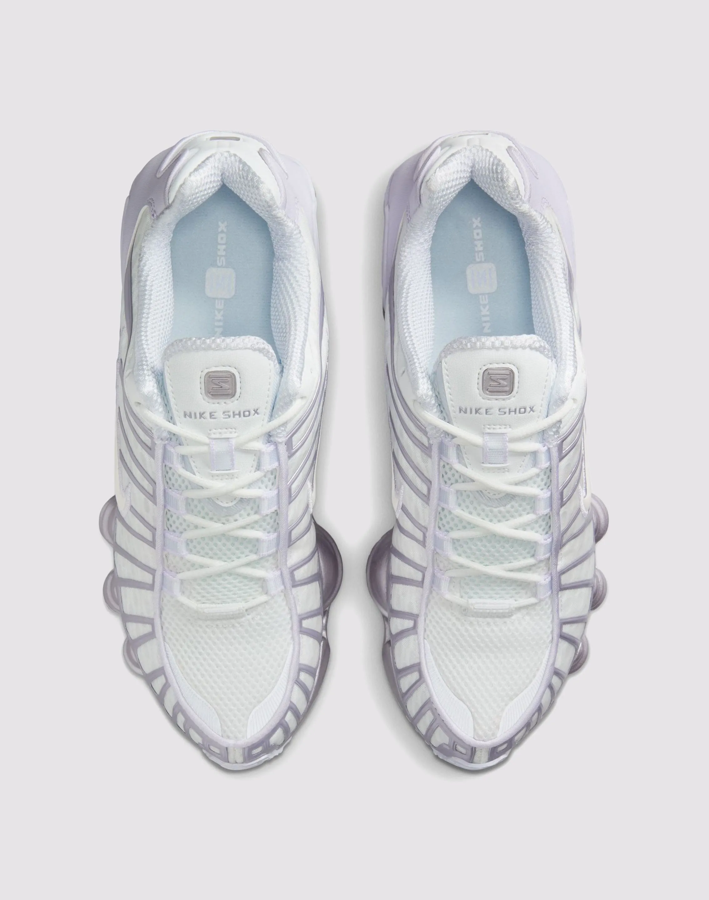 running in a drawbridge area shoes Comfortable Cushion Nike Shox TL