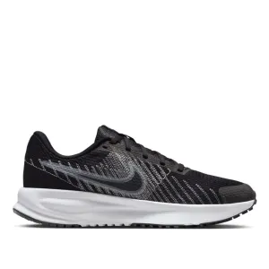 Nike Women's Run Defy Road Running Shoes running on a synthetic track shoes