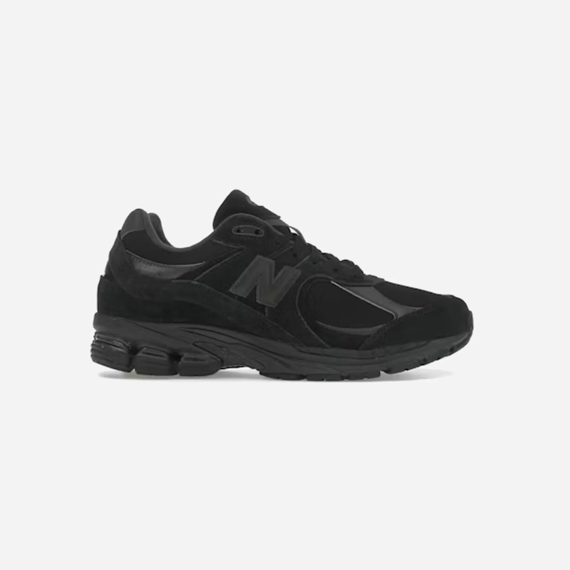 New Balance 2002R Triple Black Suede skiing shoes for beginners