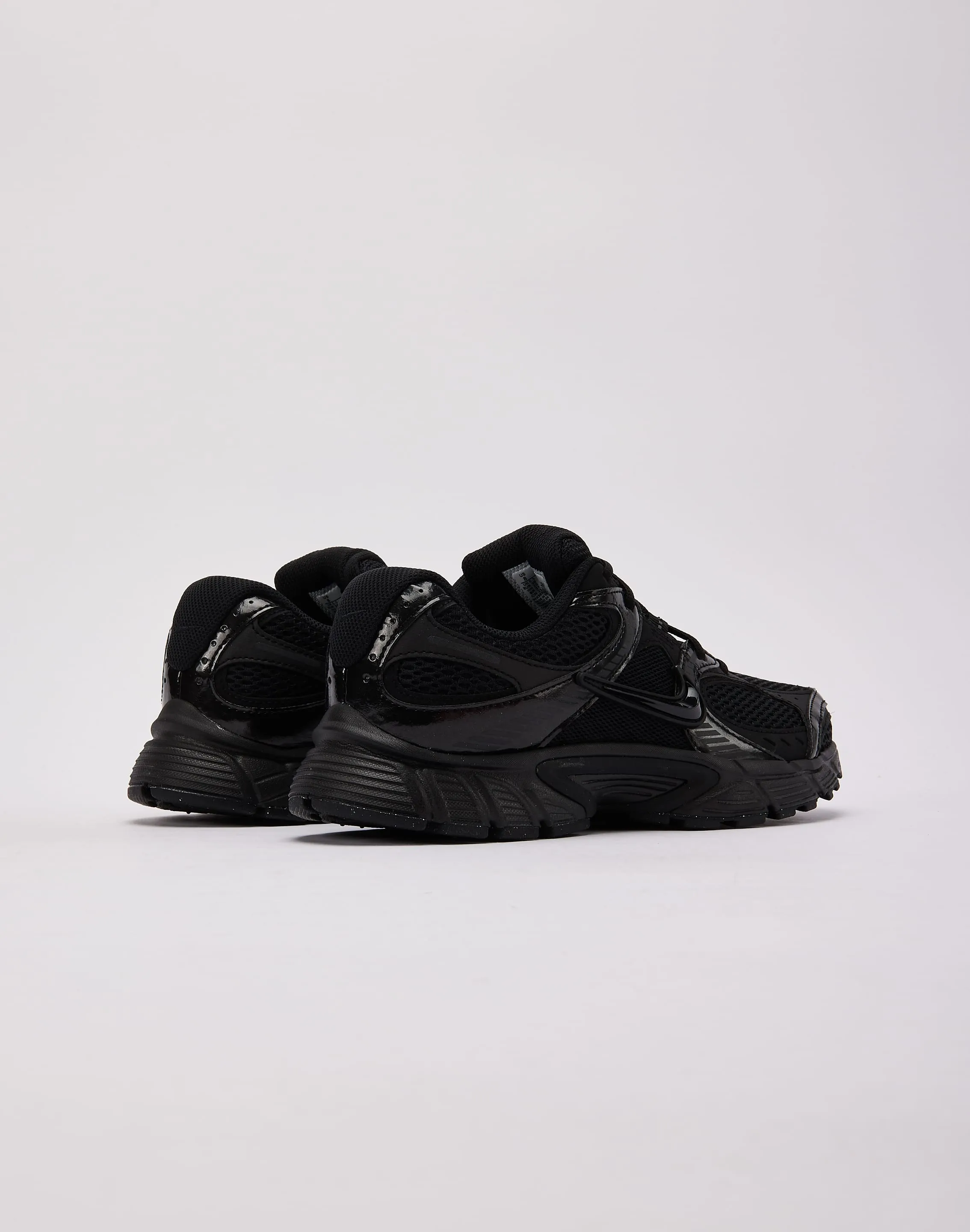 running in a field shoes Nike V5 RNR