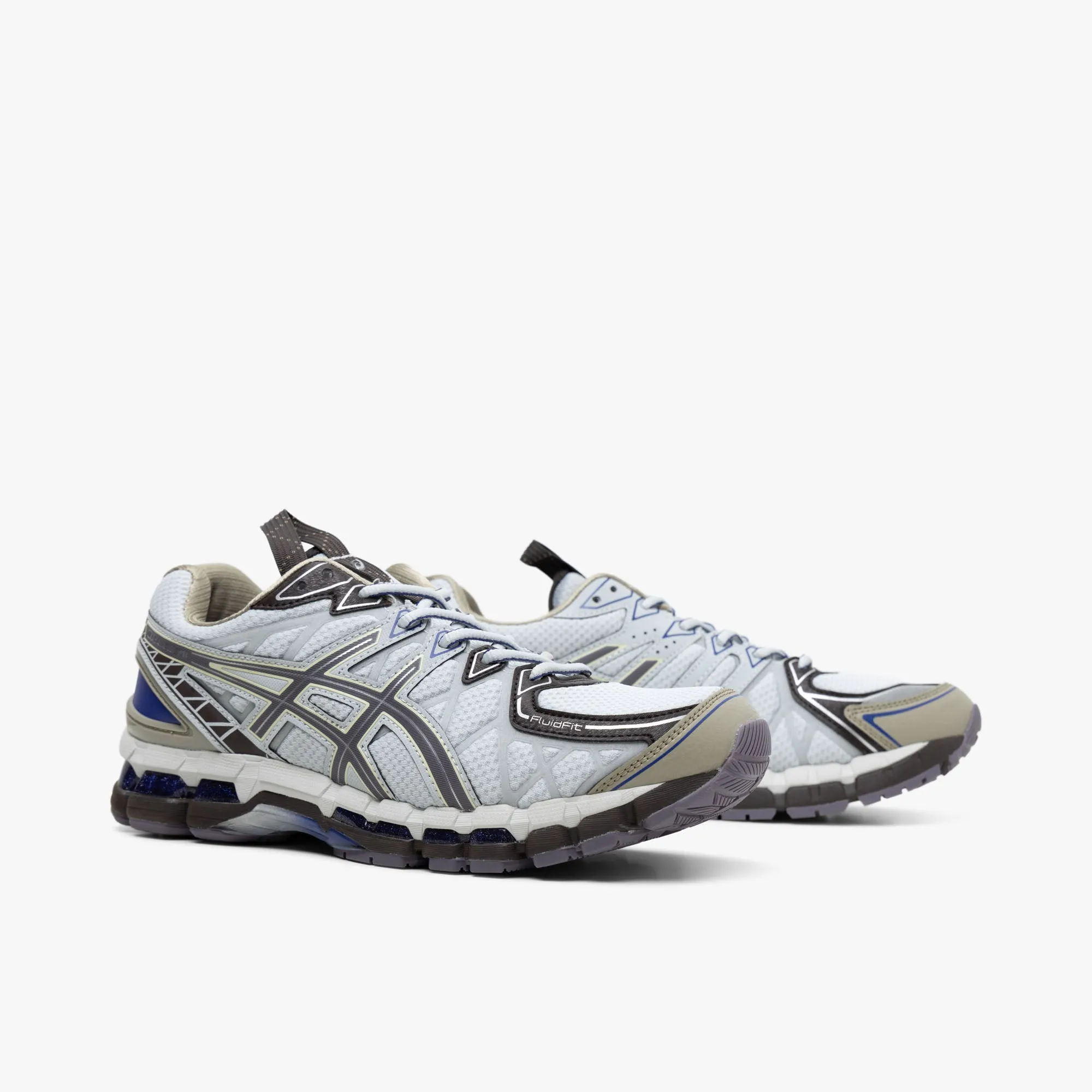 ASICS UB10-S Gel-Kayano 20 Glacier Grey / Lavender Grey running in a mountain range shoes